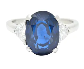 Mid-Century 7.13 CTW Oval Cut No-Heat Thai Sapphire Trillion Cut Diamond Platinum Vintage Three Stone Ring GIA