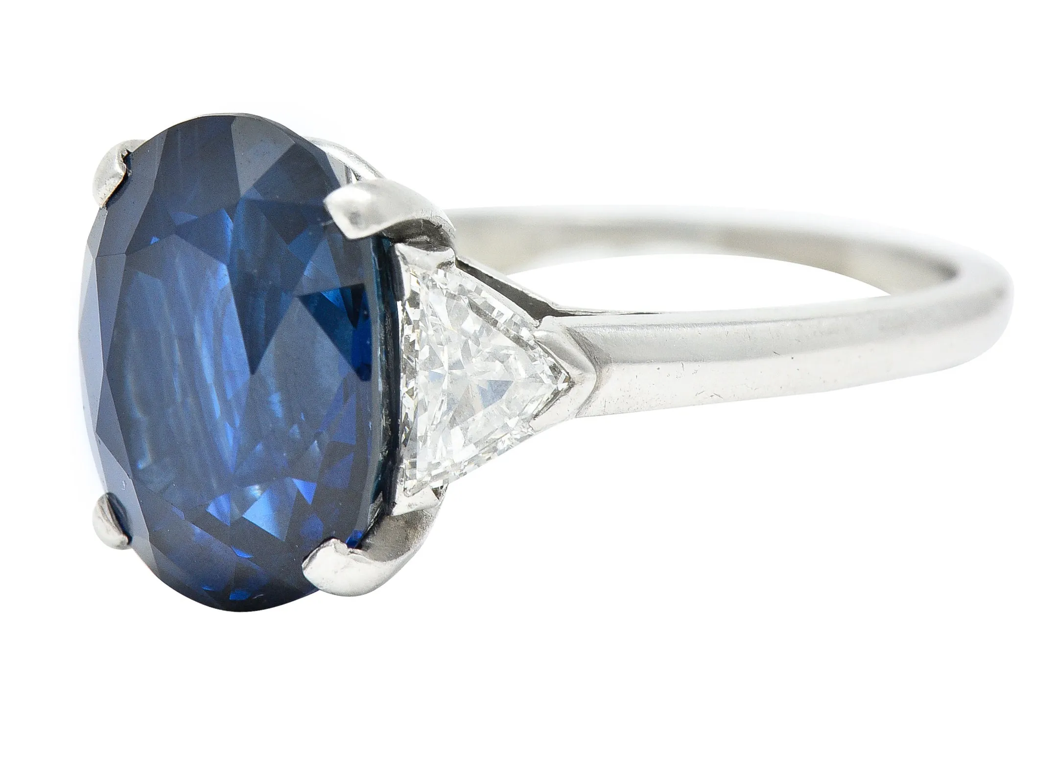 Mid-Century 7.13 CTW Oval Cut No-Heat Thai Sapphire Trillion Cut Diamond Platinum Vintage Three Stone Ring GIA